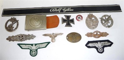 Lot 204 - A Small Collection of Third Reich and Later Items, comprising:- a copy of an Iron Cross, First...