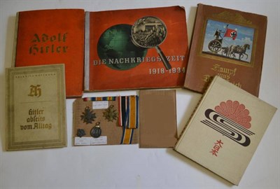 Lot 207 - A Small Collection of German Third Reich Items, comprising two German War Merit Cross with...