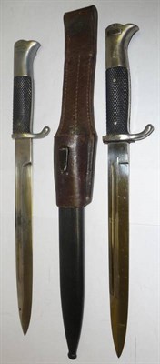 Lot 212 - A German Third Reich Parade Bayonet, the steel blade stamped with WKC visored helmet logo, the...