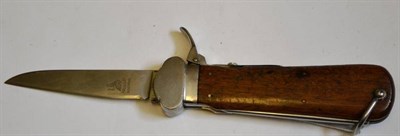 Lot 213 - A German Third Reich Parachutist's Gravity Knife, the steel blade etched with SMF logo,...