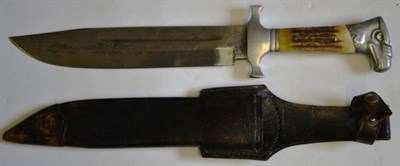 Lot 218 - A German Third Reich Trench Knife, the clip point steel blade with bevelled edge and narrow fuller