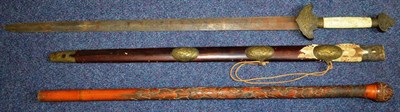 Lot 231 - A 19th Century Chinese Sword, the 85cm double edge steel blade etched with deities and symbols, the