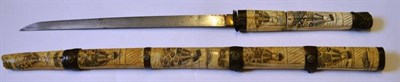 Lot 232 - A Japanese Wakizashi, with 37cm single edge steel blade, brass one piece habaki, the sectional bone