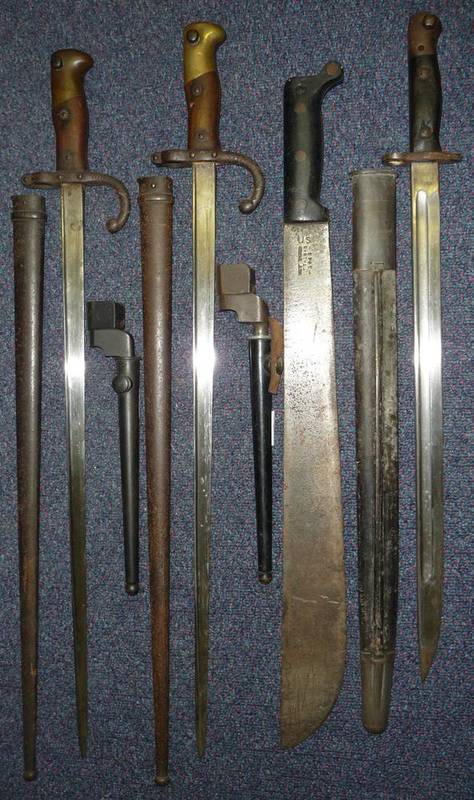 Lot 272 - Two French Model 1874 Gras Sword Bayonets, one with steel scabbard with matching numbers, the other