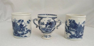 Lot 54 - A Pair of Chinese Blue and White Export Porcelain Jars, circa 1790, each of plain cylindrical form
