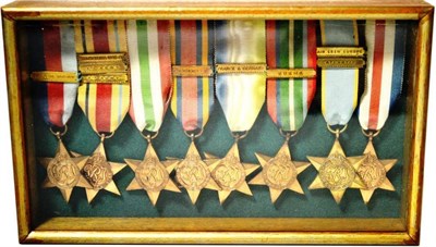 Lot 12 - A Collection of Eight Copy Second World War Stars, in a glazed display case