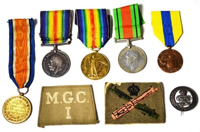 Lot 18 - A First/Second World War Group of Three Medals, awarded to 133773 PTE.J.FAIRLAMB. M.G.C.,...