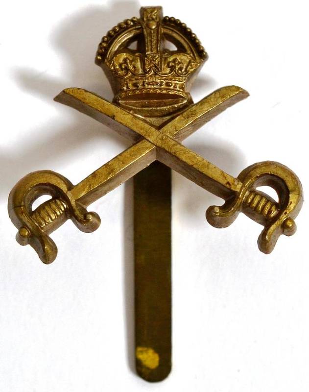 Lot 91 - A Scarce Bakelite Badge to the Royal Army Physical Training Corps, with brass slider