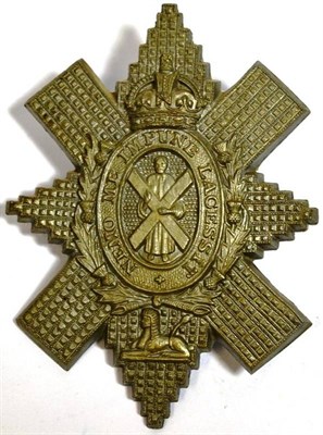 Lot 96 - A Scarce Bakelite Cap Badge to the Black Watch, with brass tangs