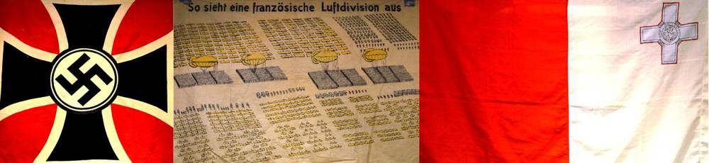 Lot 289 - A German Third Reich Flag, with a central circular panel containing a swastika, on a black...