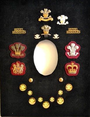 Lot 111 - The 10th Royal Hussars - a display of twenty two cap badges, collar dogs, shoulder titles,...