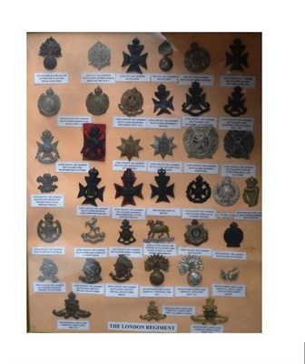 Lot 114 - ;The London Regiment;, a display of cap badges to the forty various battalions of the London...