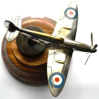 Lot 132 - A Chromium Plated Brass Car Mascot as a Spitfire, with enamel roundels and moving propeller blades