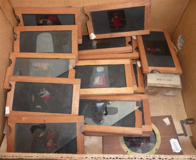 Lot 155 - A Collection of Hand Coloured Magic Lantern Slides, including a mahogany framed mechanical...