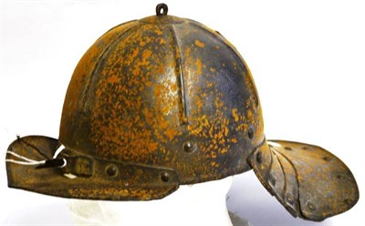 Lot 174 - An East European Lobster Tail Helmet (Zischagge), possibly 17th Century, the one piece skull...