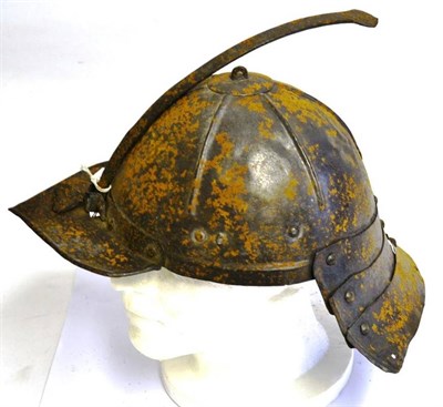 Lot 176 - An East European Lobster Tail Helmet (Zischagge), possibly 17th Century,  the one piece skull...