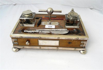 Lot 158 - An Electroplate Mounted Oak Inkstand, circa 1890, of rectangular form with twin inkwells and...