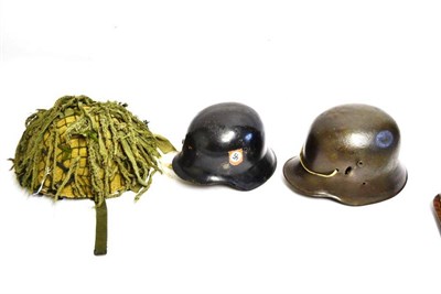 Lot 187 - A Second World War German Police Helmet, with black finish and later single decal, later...