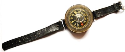 Lot 197 - A German Third Reich Luftwaffe Armbandkompass 39 (Wrist Compass), the circular dial with...