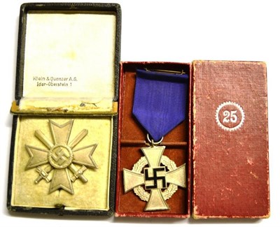 Lot 208 - A German Third Reich War Merit Cross with Swords, First Class, the sword shape pin stamped 65,...