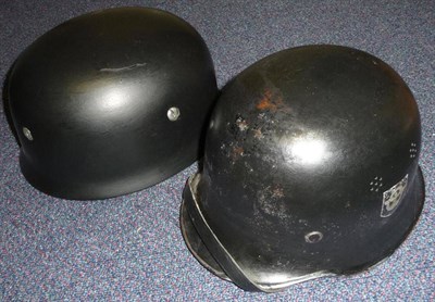 Lot 210 - A German Third Reich M1938 Paratrooper's Helmet, with black paint, slotted bolts, folded rim, inner