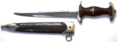 Lot 218 - A German Third Reich SA Dagger, the double edge steel blade etched Alles fur Deutschland, with...