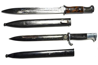 Lot 222 - A German Third Reich Parade Bayonet, the blade stamped Gustav Spitzer, Solingen, with two piece...