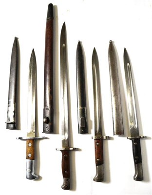 Lot 244 - Four Bayonets:- a Swiss Army M1918, the 30cm double edge steel blade stamped ELSENER SCHWYZ,...