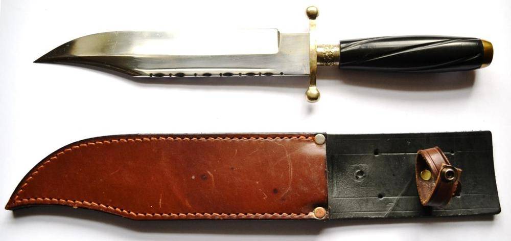 Lot 276 - A Bowie Knife by J E Middleton & Sons, Rockingham Street, Sheffield, the 21cm clip point steel...