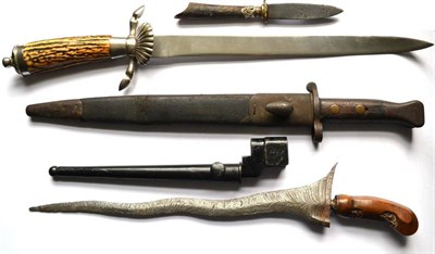 Lot 293 - A Copy of a German Hunting Knife, the steel hilt with shell guard, recurving crossguard with deer's