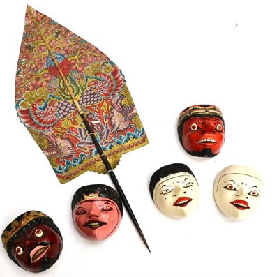 Lot 334 - A Collection of Five Javanese Wood Character Masks, each with pointed nose and pierced smiling...