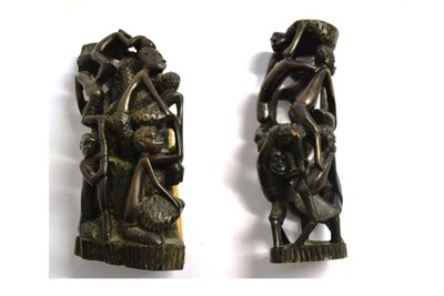 Lot 340 - A Makonde Ebony Tree of Life Carving, Tanzania, intricately carved with six climbing figures,...