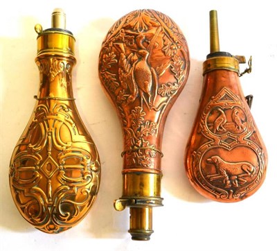 Lot 351 - Three 19th Century Copper Powder Flasks:- one embossed with interlaced strapwork, with external...