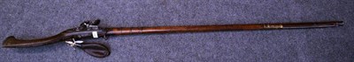 Lot 462 - A 19th Century Afghan Flintlock Jezail, the 132cm steel barrel with slightly flared leaf chased...