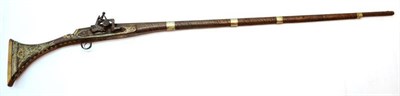 Lot 489 - A 19th Century Afghan Snaphaunce Musket, with 130cm steel barrel, wood full stock with four...