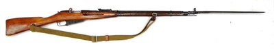 Lot 490 - A Deactivated Russian Mosin Nagant Bolt Action Carbine, numbered BO 6546 and dated 1942, with...