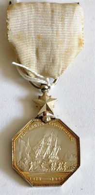 Lot 9 - An Arctic Medal 1857, un-named as issued (solder repair to suspender and knocks to edge)