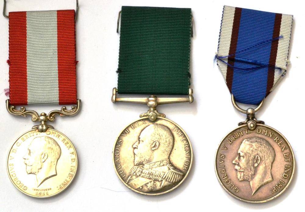 Lot 22 - A Rocket Apparatus Volunteer Long Service Medal (George V), awarded to WILLIAM HARRISON; a...