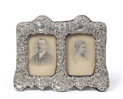 Lot 196 - A Late Victorian Silver Mounted Easel Back Double Photograph Frame, Chester 1901, of arched...