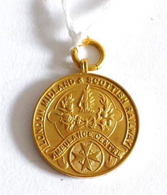 Lot 77 - A 9 Carat Gold London Midland & Scottish Railway Ambulance Centre Long Service Medal, awarded to T.