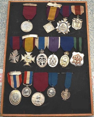 Lot 80 - A Collection of Fifteen Military Temperance Medals, in silver and white metal,  including the Royal