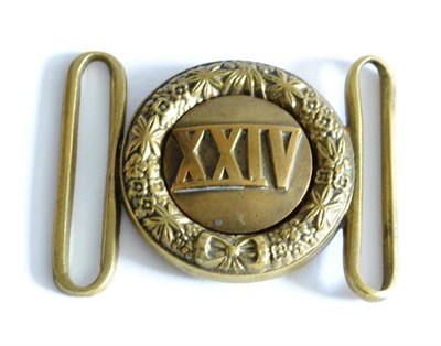 Lot 121 - A South Wales Borderer's Brass Belt Buckle, circa 1950-69, the circular clasp cast XXIV