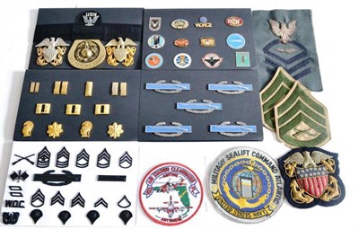 Lot 161 - A Large Collection of US Armed Forces Metal Insignia and a Cloth Patches, mainly post-war, to...