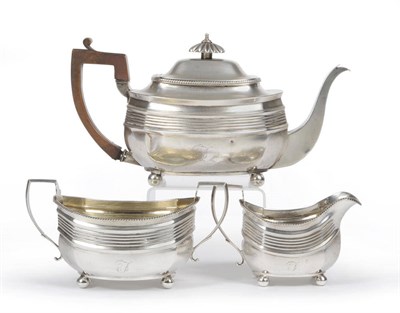 Lot 208 - A George III Three Piece Teaset, Charles Fox, London 1810, comprising cushion shape teapot with...