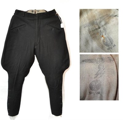 Lot 194 - A Pair of German Third Reich SS Black Wool Breeches, with buttoned fly and lower legs, black...