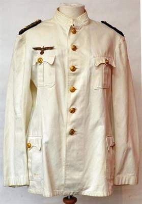 Lot 205 - A German Third Reich Kriegsmarine Summer Tunic (Early Pattern) to a Fregettenkapitan...