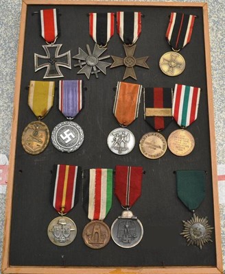 Lot 208 - Thirteen German Third Reich Medals:- Iron Cross second class; War Merit Cross with Swords; War...