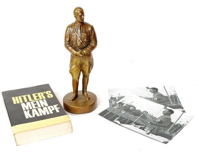 Lot 238 - A Brass Figure of Adolf Hitler, standing wearing brown shirt and breeches on a circular plinth,...