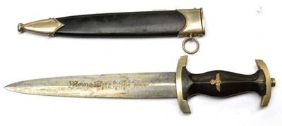 Lot 248 - A German Third Reich SS Dagger, the steel blade etched Meine Ehre heist Treue, and with maker's...