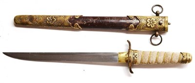 Lot 260 - A Japanese Second World War Naval Dirk, the 23cm single edge steel blade with a narrow fuller...